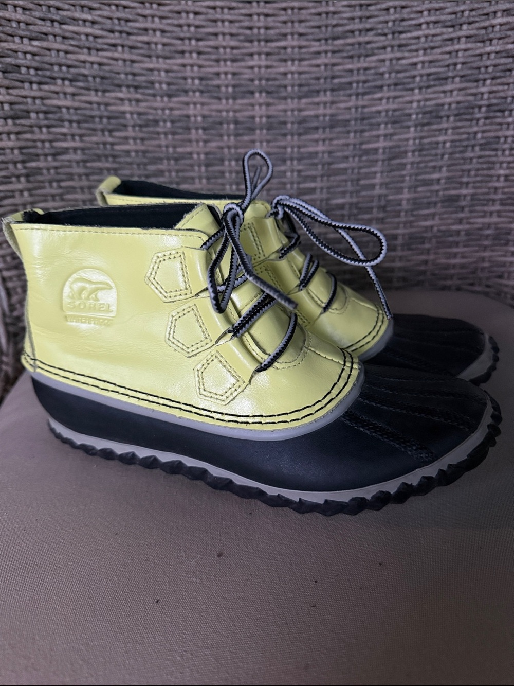 Sorel women’s Out N About Black and Yellow Waterproof Duck Boots